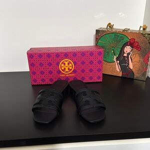 Tory Burch Black Sandals Elegant and Versatile
NIB never worn